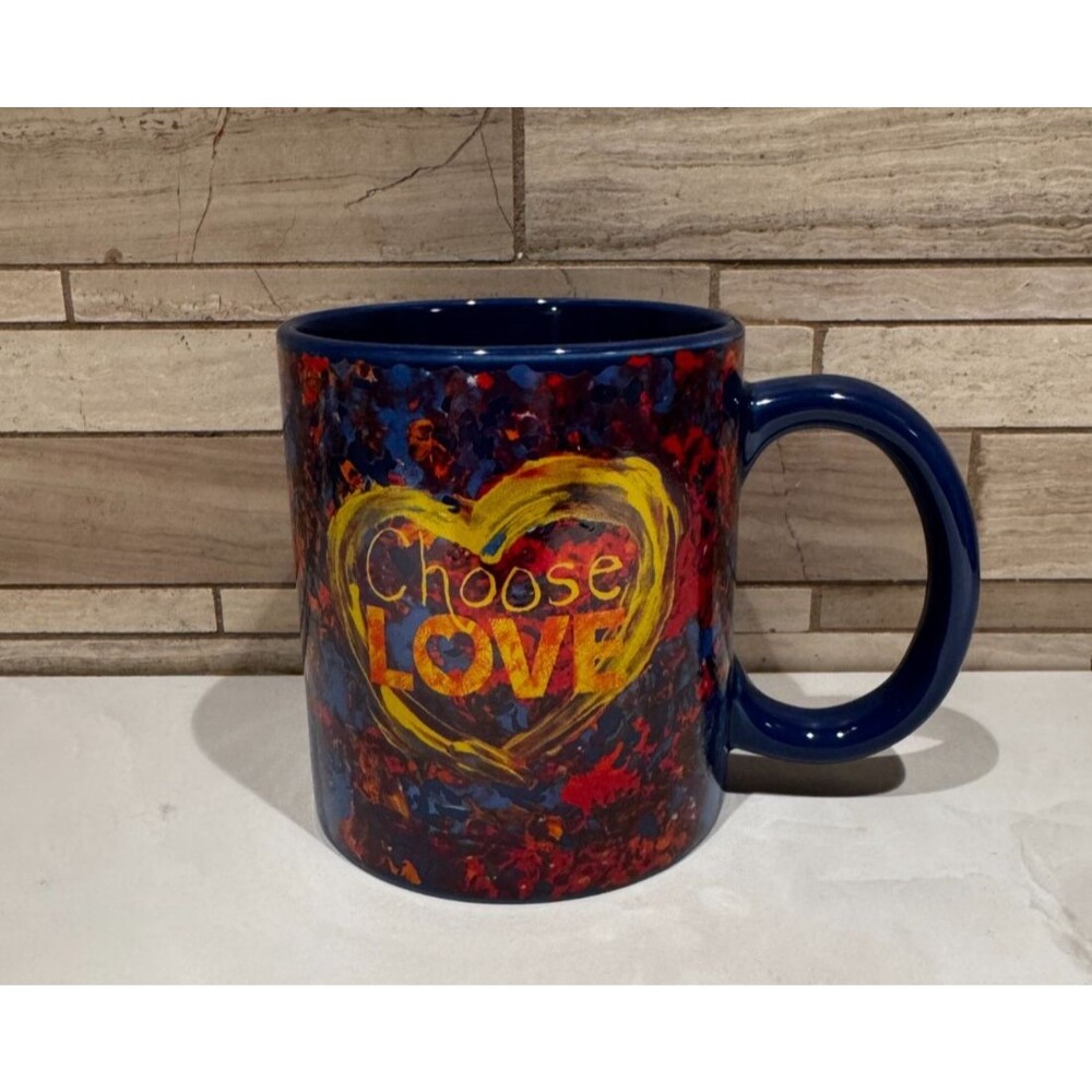 A Lovely Multicolor Penzey's Mug Decorated with A Heart